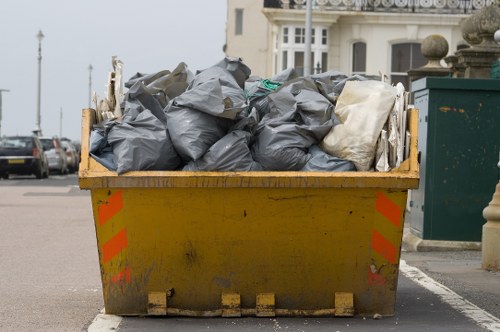 Commercial waste collection truck in Manor Park